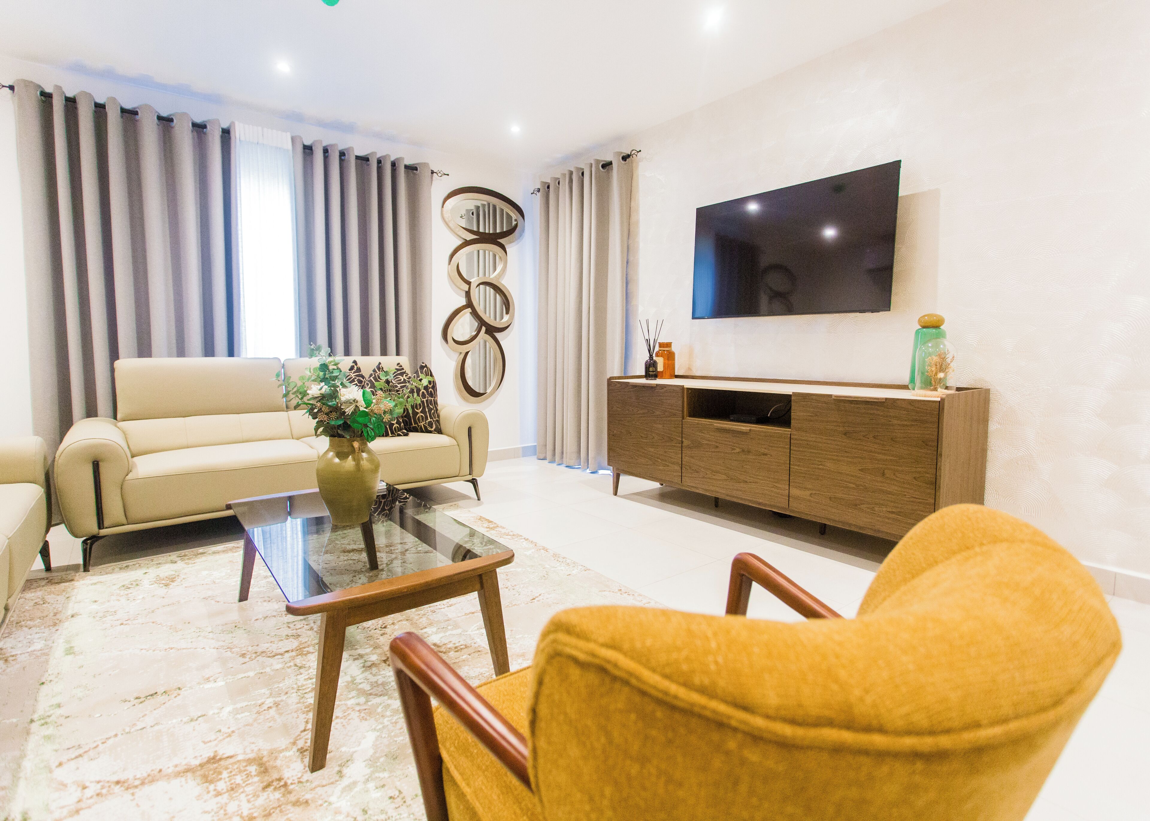 Luxury Apartment, 2 Bedrooms, Balcony | Living area | 55-inch Smart TV with satellite channels, Netflix, streaming services