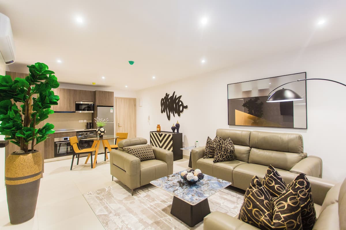 Luxury Apartment, 1 Bedroom, Balcony | Living area | 55-inch Smart TV with satellite channels, Netflix, streaming services