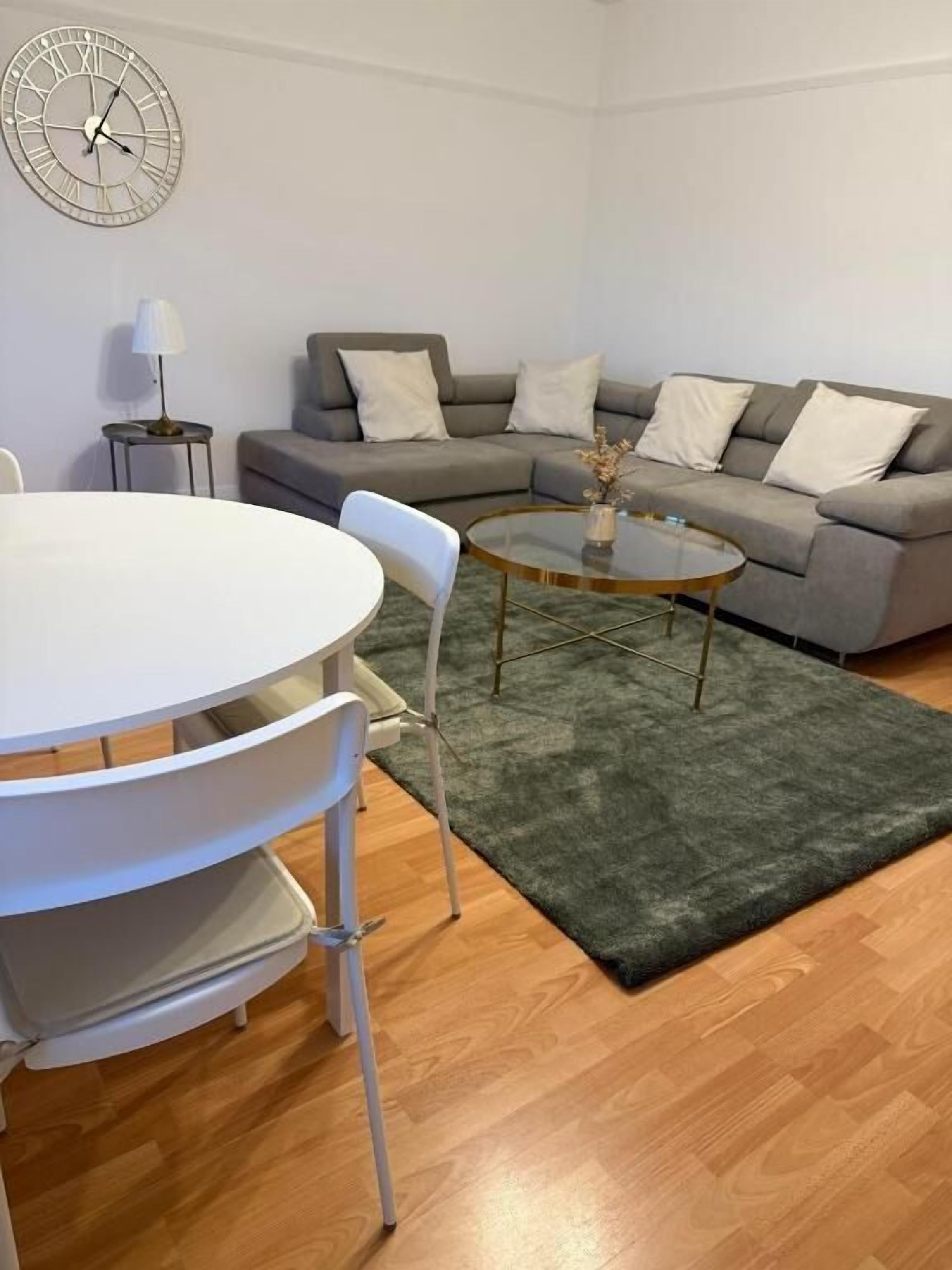 Apartment, City View | Living area | Flat-screen TV