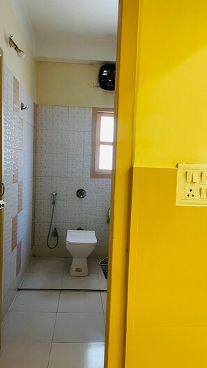 Deluxe Double Room | Bathroom - Swastik Regency (Siliguri)