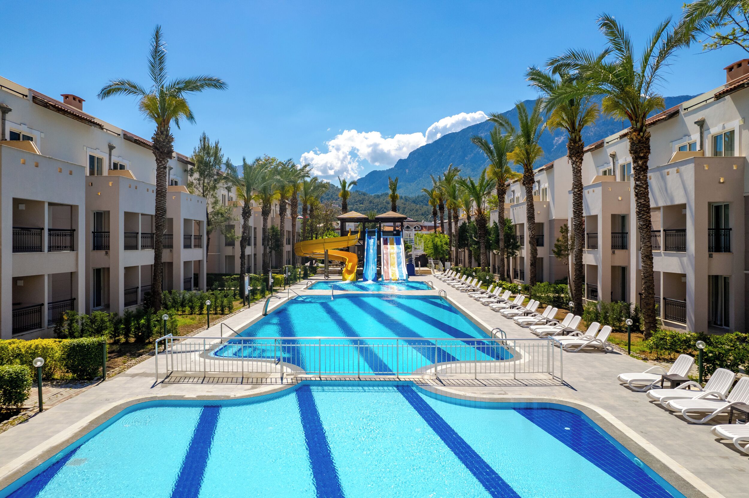 Indoor pool, seasonal outdoor pool, pool umbrellas, pool loungers