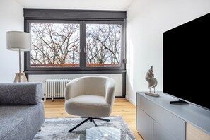 TV - Apartment 'Al Mare' with Sea View, Shared Garden and Wi-Fi (Wunstorf)