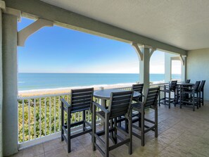 Outdoor dining - Remodeled oceanfront corner condo 541 in Cinnamon Beach!! (Palm Coast)