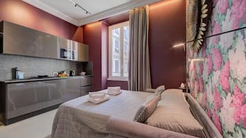 Appartement Deluxe, vue ville | Coin séjour