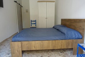 مكواة/لوح كي وملاءات أسرّة