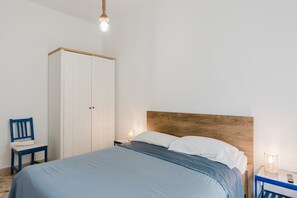 Fer et planche à repasser, draps fournis