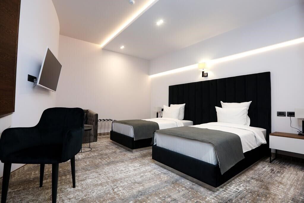 Habitació econòmica, diversos llits, sense finestres | Caixa forta a l'habitació i wifi gratuïta 