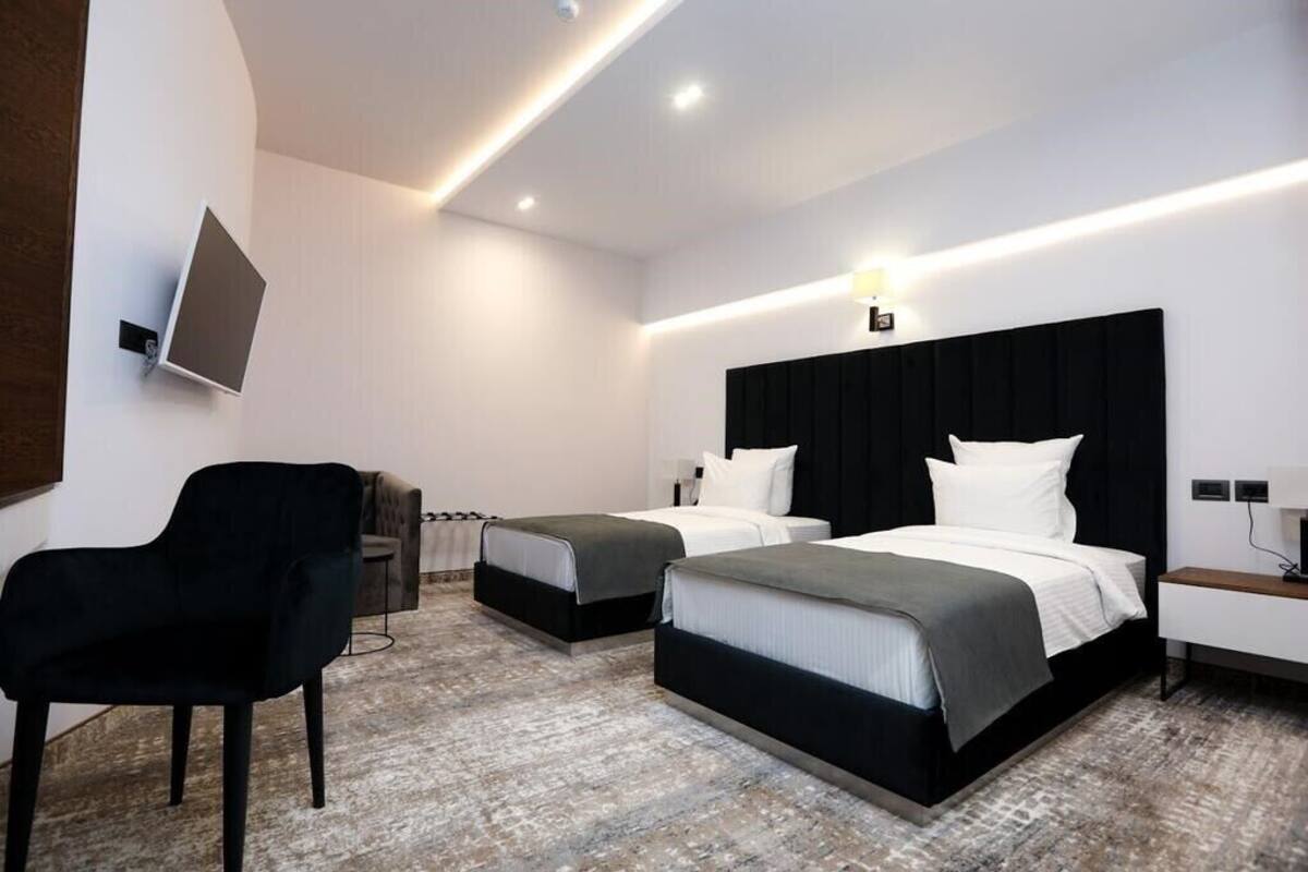 Economy Room, 2 Twin Beds, No Windows | Minibar, in-room safe, soundproofing, rollaway beds (surcharge)