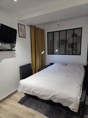 1 chambre, fer et planche à repasser, Wi-Fi, draps fournis