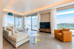 TV - Luxury Villa with Mesmerising Sea-and-Island Views and Large Private Pool (Perigiali)