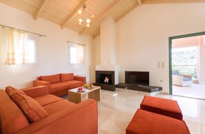 TV - Stylish Contemporary House with Sea Views near Spartachori and Beach (Spartochori)