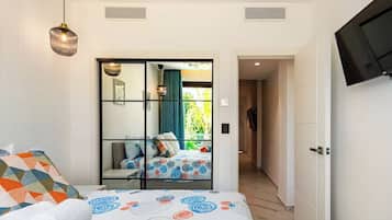 Coffres-forts dans les chambres, fer et planche Ă repasser