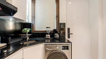 Superior Suite, Balcony, Pool View | Private kitchen