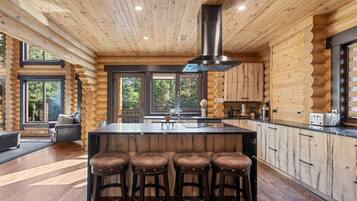 Fridge, microwave, coffee/tea maker, cookware/dishes/utensils