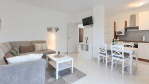 A modern apartment with a living area, dining space, and kitchen. - House Anka (16038-K1) - Medulin (Medulin)