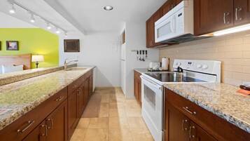 Fridge, microwave, oven, dining tables