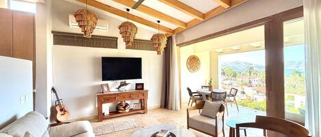 Deluxe Condo | Living area | TV