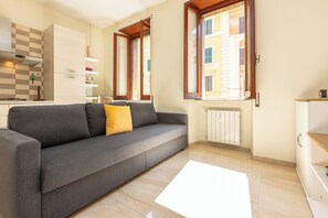 Apartment | Living area | 40-inch TV with digital channels - Rental in Rome Vatican Museum Apartment (Rome)