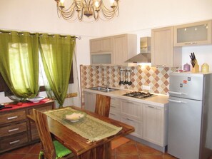 Fridge, cookware/dishes/utensils - Dammuso mit Terrasse und Meerblick by Interhome (Pantelleria)