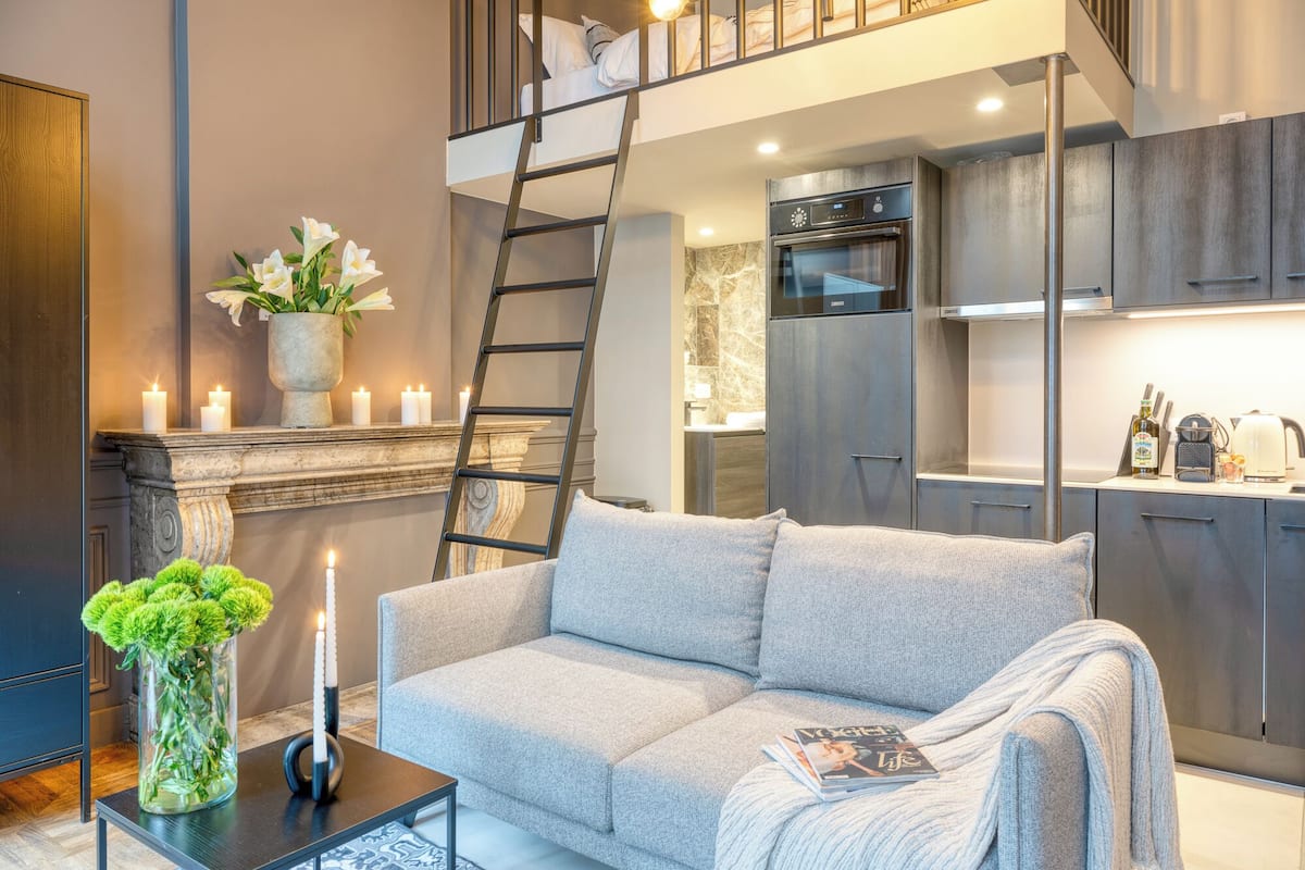 Studio Suite, Mezzanine | Living area | 40-inch flat-screen TV with digital channels