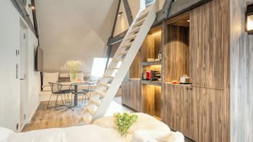 Premium Apartment, 1 Queen Bed with Sofa bed, Mezzanine | Living area | 40-inch flat-screen TV with digital channels