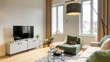 Superior Apartment, 1 Queen Bed with Sofa bed | Living area | 40-inch flat-screen TV with digital channels