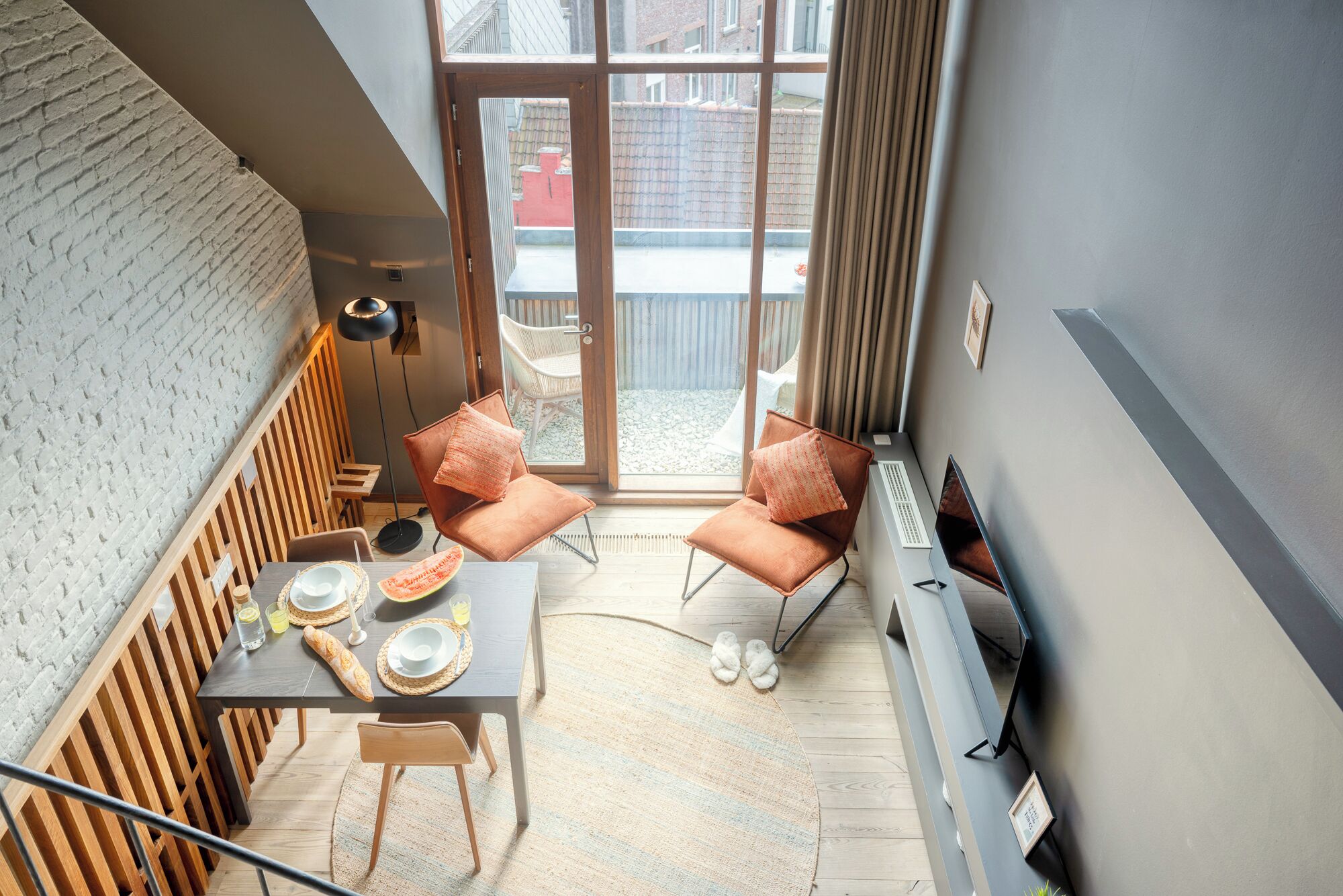 Deluxe Studio Suite, Balcony, Mezzanine | Laptop workspace, blackout drapes, iron/ironing board, free WiFi