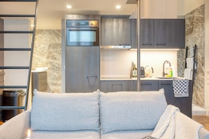 Studio Suite, Mezzanine | Living area | 40-inch flat-screen TV with digital channels - ROMY Ghent - Brabantdam (Ghent)