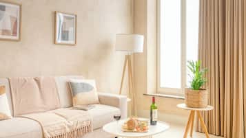 Luxury Apartment, 1 Queen Bed with Sofa bed, Garden View | Living area | 40-inch flat-screen TV with digital channels