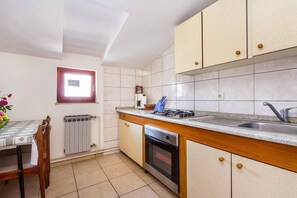 Fridge, microwave, coffee/tea maker, toaster