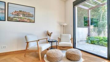 Departamento Premium, vista al mar | Área de sala de estar