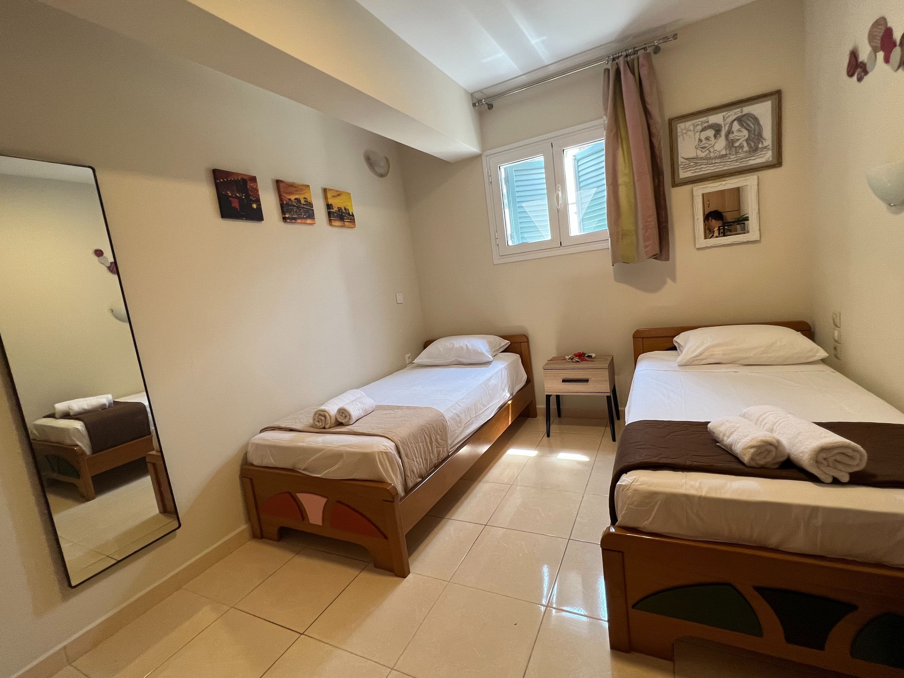 2 dormitorios, tabla de planchar con plancha, wifi gratis y ropa de cama