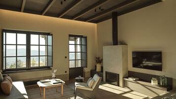 Een televisie, een open haard en een kantoor