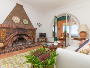 Fernseher, Kamin