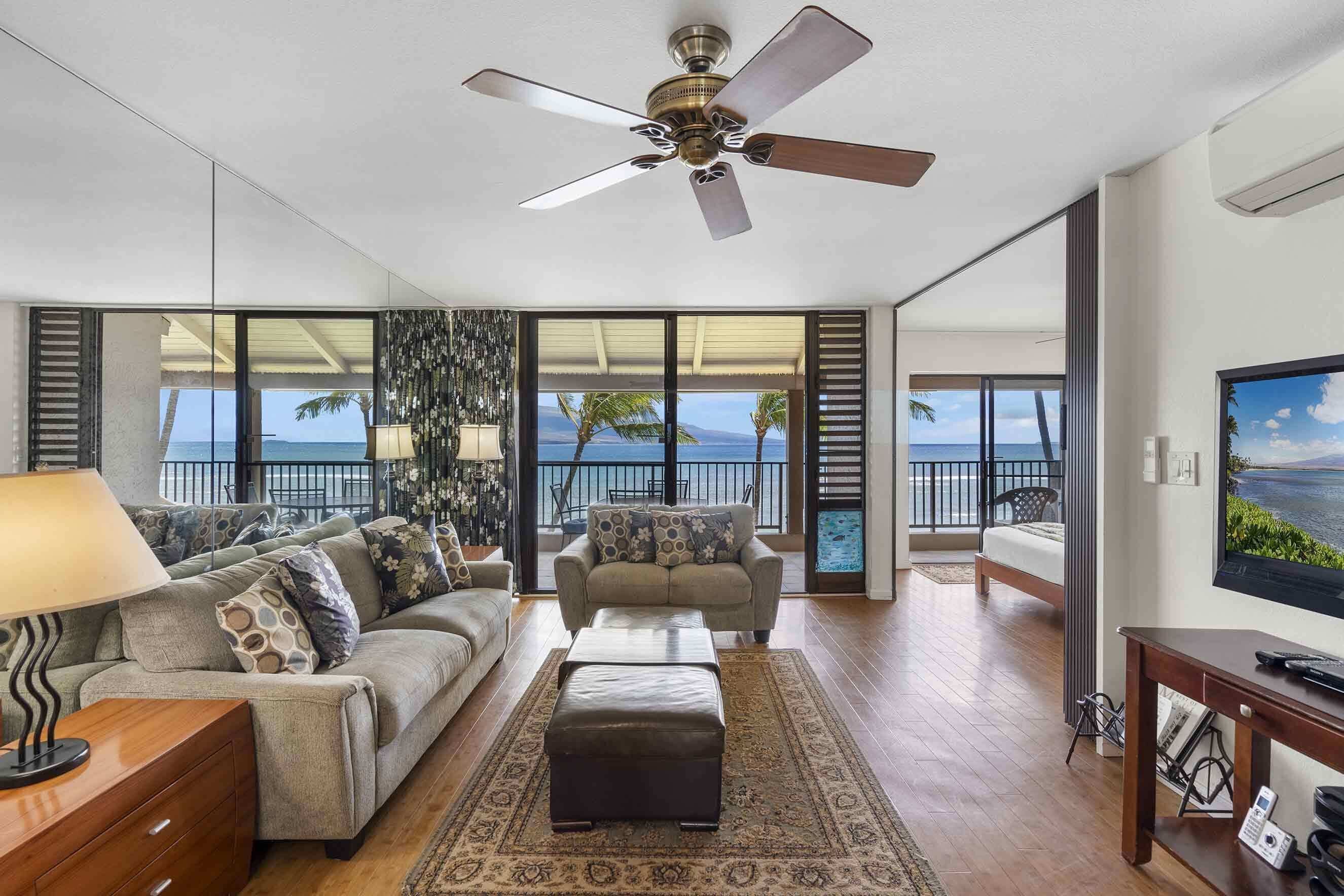 Condo, varias camas, balcón, vista al océano (Lauloa 410) | Área de sala de estar