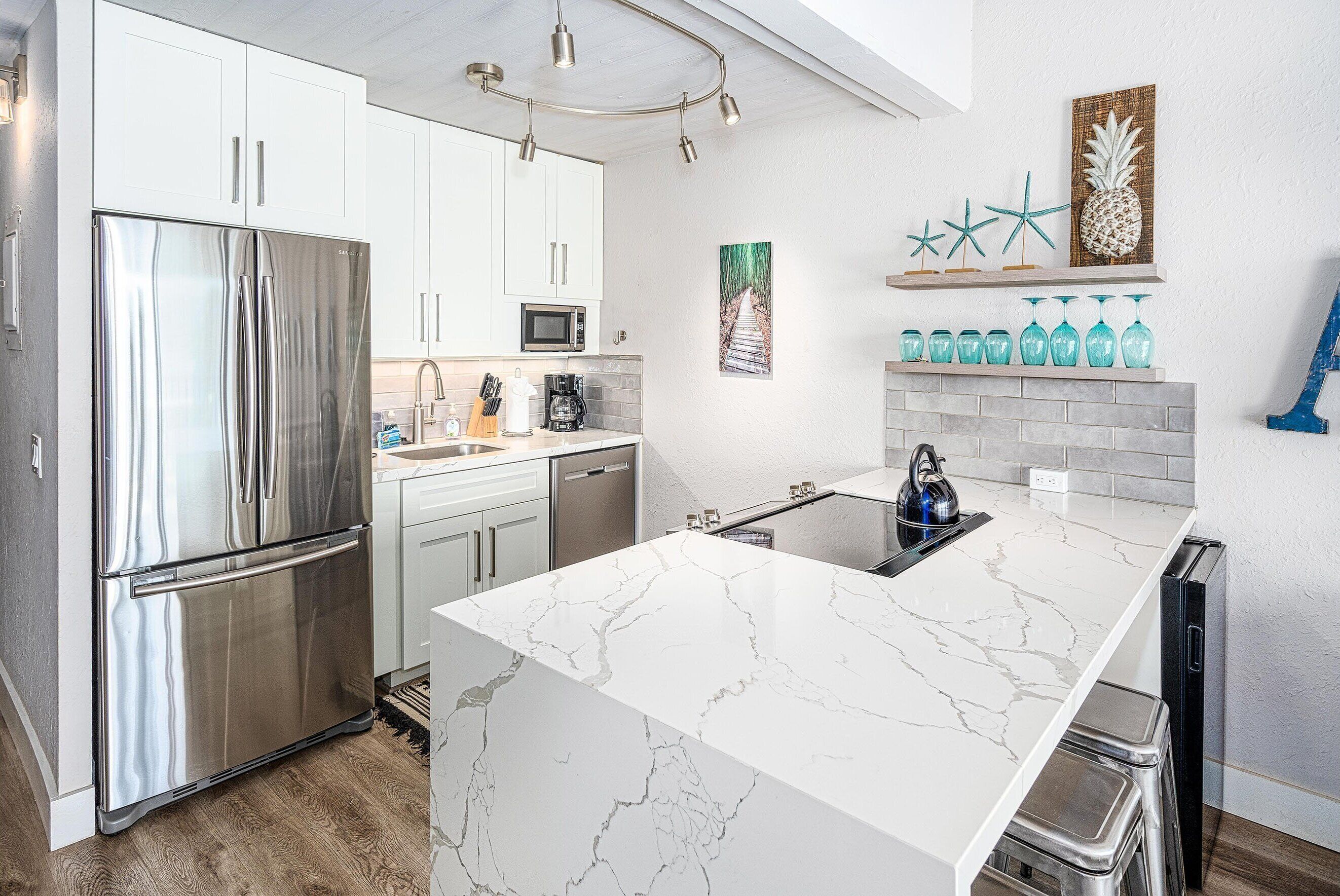 คอนโด, หลายเตียง, ระเบียง, วิวทะเล (Maalaea Banyans 411) | ครัวส่วนตัว | เครื่องชงกาแฟ/ชา, โต๊ะรับประทานอาหาร