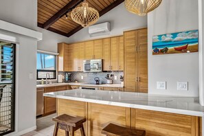 Condo, 1 King Bed with Sofa bed, Balcony, Ocean View (Wailea Ekolu 1204) | Private kitchen | Coffee/tea maker, dining tables - Wailea Ekolu 1204 - Modern Ocean View Condo w/ Large Lanai, King Bed, & Split AC (Kihei)