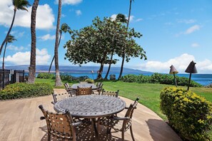 Outdoor dining - Experience Oceanfront Luxury at Kanai A Nalu 209, a Spacious 2-bd/2ba Condo, AC! (Wailuku)