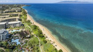 A resort with a beachfront, swimming pool, and lush greenery. - New Listing! Honua Kai Luana Garden Villas 7B - Ground Level, Private Lanai, BBQ (Lahaina)