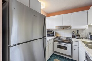 Studio, 1 King Bed, Balcony, Ocean View (Wailea Ekahi 12D) | Private kitchen | Coffee/tea maker, dining tables - Wailea Ekahi 12D - Budget Friendly Ocean View Studio w/ Lanai, Kitchen, WD, & AC (Kihei)
