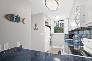 Condo, Multiple Beds, Balcony, Ocean View (Kanai A Nalu 314) | Private kitchen | Coffee/tea maker, dining tables - Kanai a Nalu 314 - Modern, Renovated, Oceanfront Condo, Breathtaking Views, AC! (Wailuku)