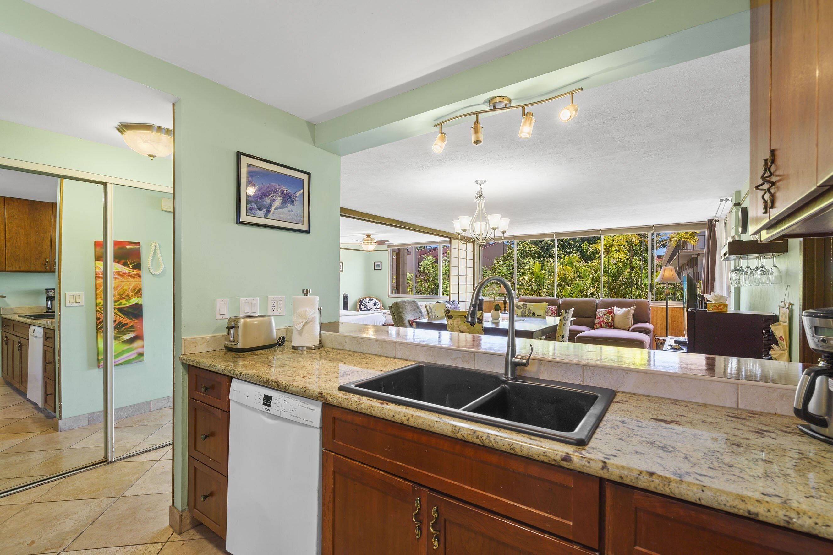 Condo, Multiple Beds, Balcony, Ocean View (Haleakala Shores A-308) | Private kitchen | Coffee/tea maker, dining tables