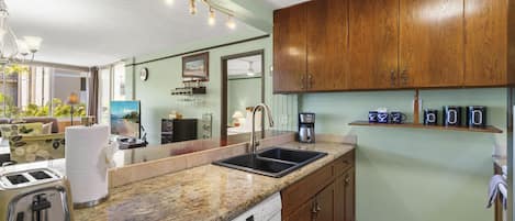 Condo, Multiple Beds, Balcony, Ocean View (Haleakala Shores A-308) | Private kitchen | Coffee/tea maker, dining tables