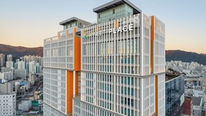 A modern high-rise building with a prominent 'HYATT PLACE' sign, featuring a grid-like facade and multiple balconies. - Hyatt Place Busan Yeonsan (Busan)