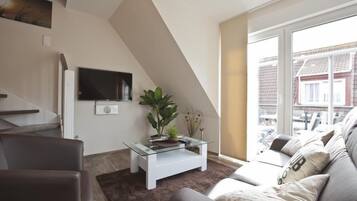 Télévision, lecteur de DVD, chaîne hi-fi