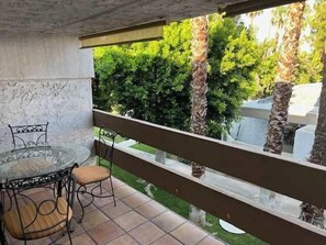 Outdoor dining - Chic Desert Condo with Mountain Views (Palm Springs)