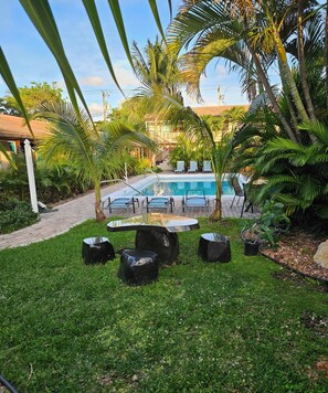Outdoor pool, open 9:00 AM to 10:00 PM, pool umbrellas, sun loungers - Blue Heron Bridge Hotel & Dive Club (Singer Island)