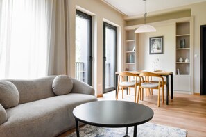 Deluxe Apartment | Living area | 55-inch TV with digital channels - Hotel Hayashi (Sofia)