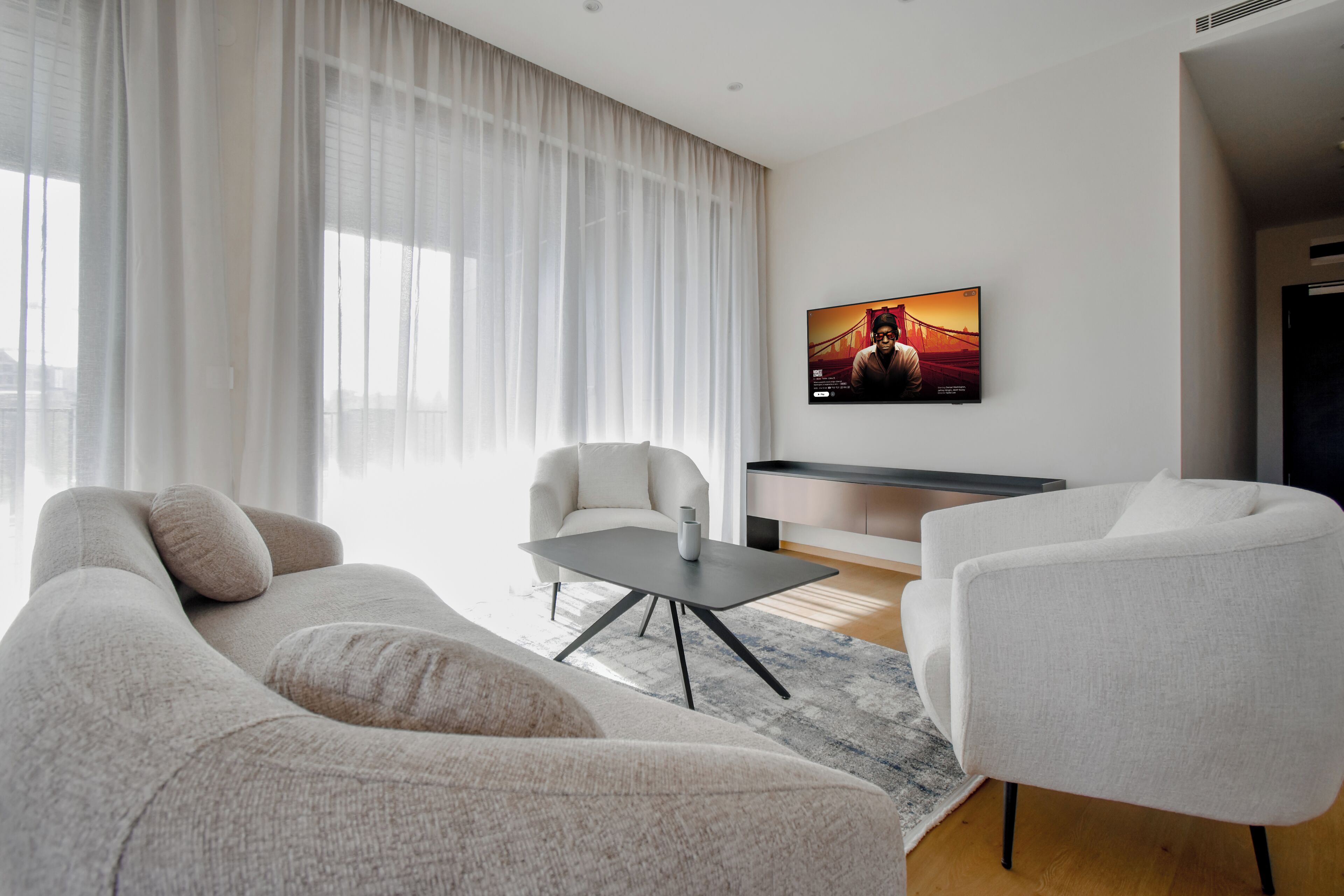 Superior Apartment, Mountain View | Living room | 55-inch TV with digital channels