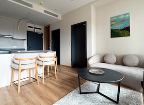 Standard Apartment | Living area | 55-inch TV with digital channels - Hotel Hayashi (Sofia)